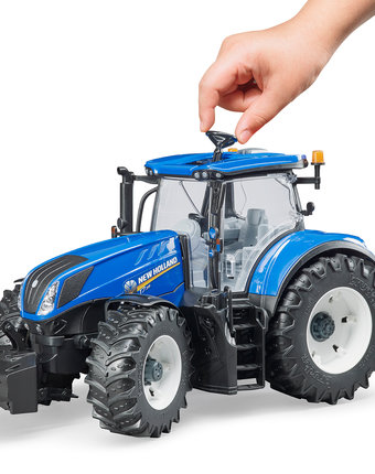 Миниатюра фотографии Bruder трактор new holland t7.315