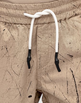 Миниатюра фотографии Бежевые брюки с принтом gulliver